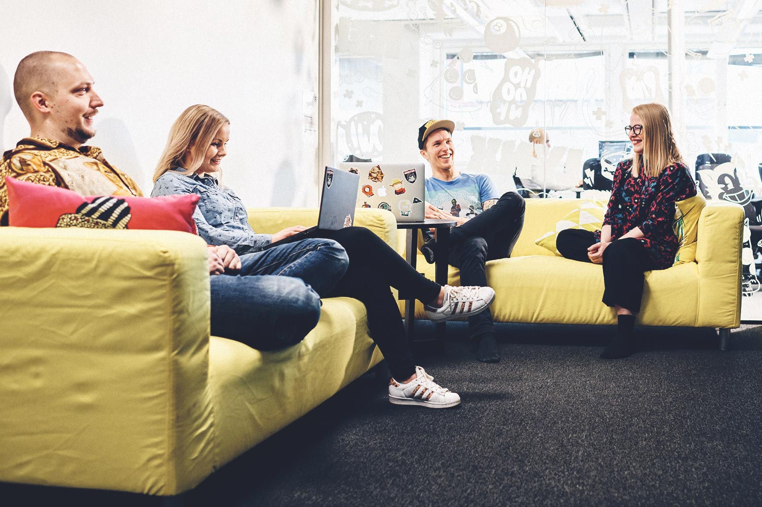 Ubisoft RedLynx game developers brainstorming in a cozy meeting room