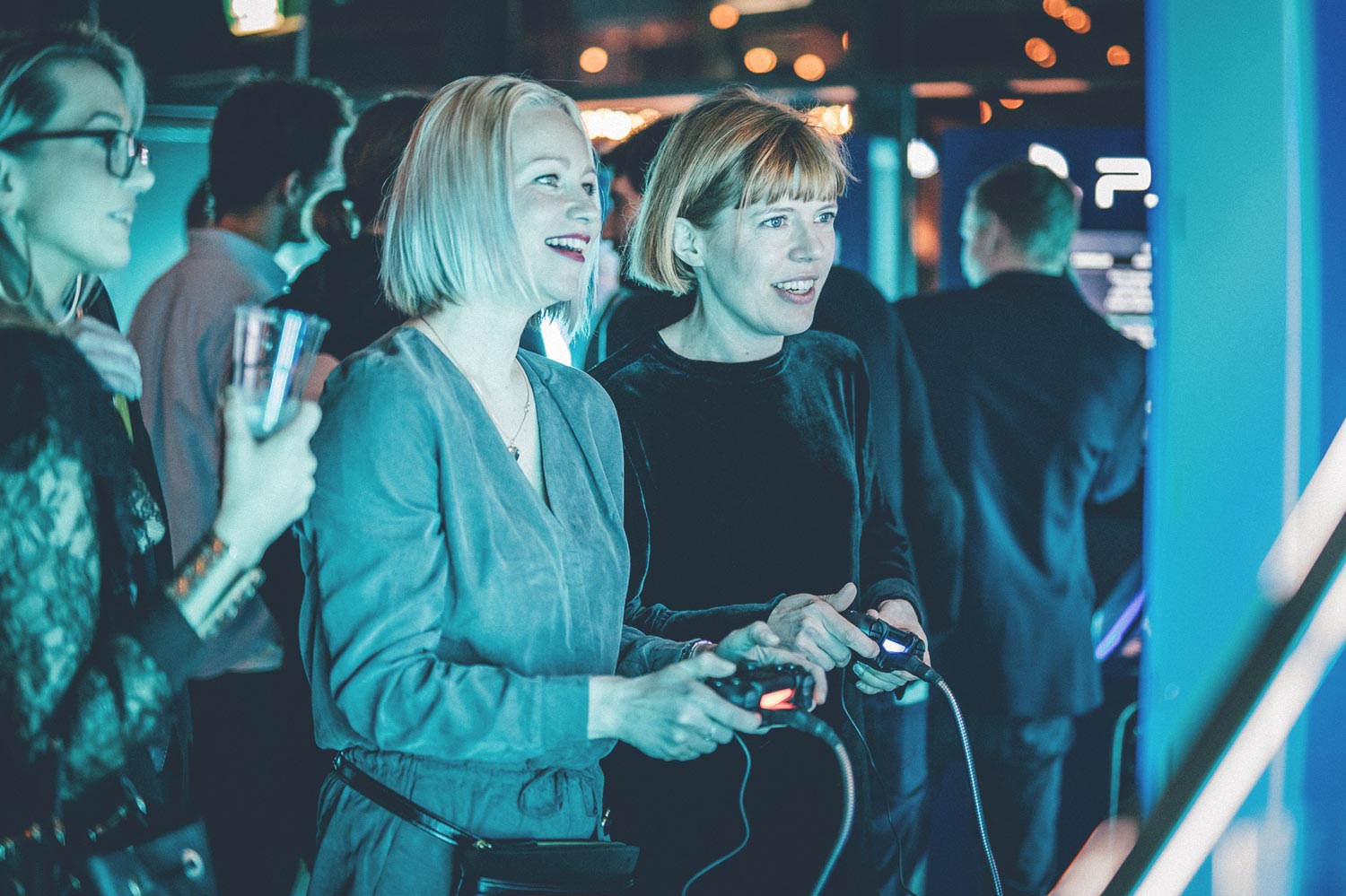 Ubisoft RedLynx women employees playing games at an event