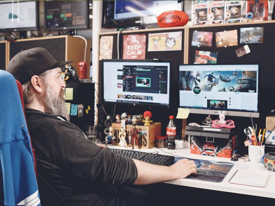 Ubisoft RedLynx game developer at his desk in Helsinki, Finland