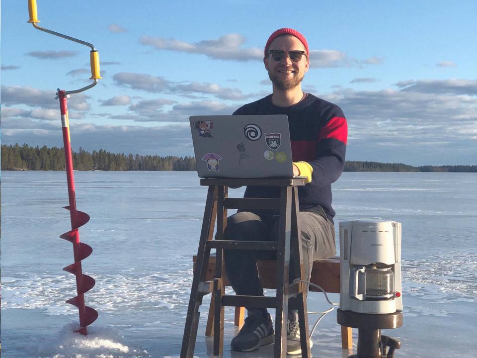 Ubisoft Redlynx team member working remotely on a frozen lake